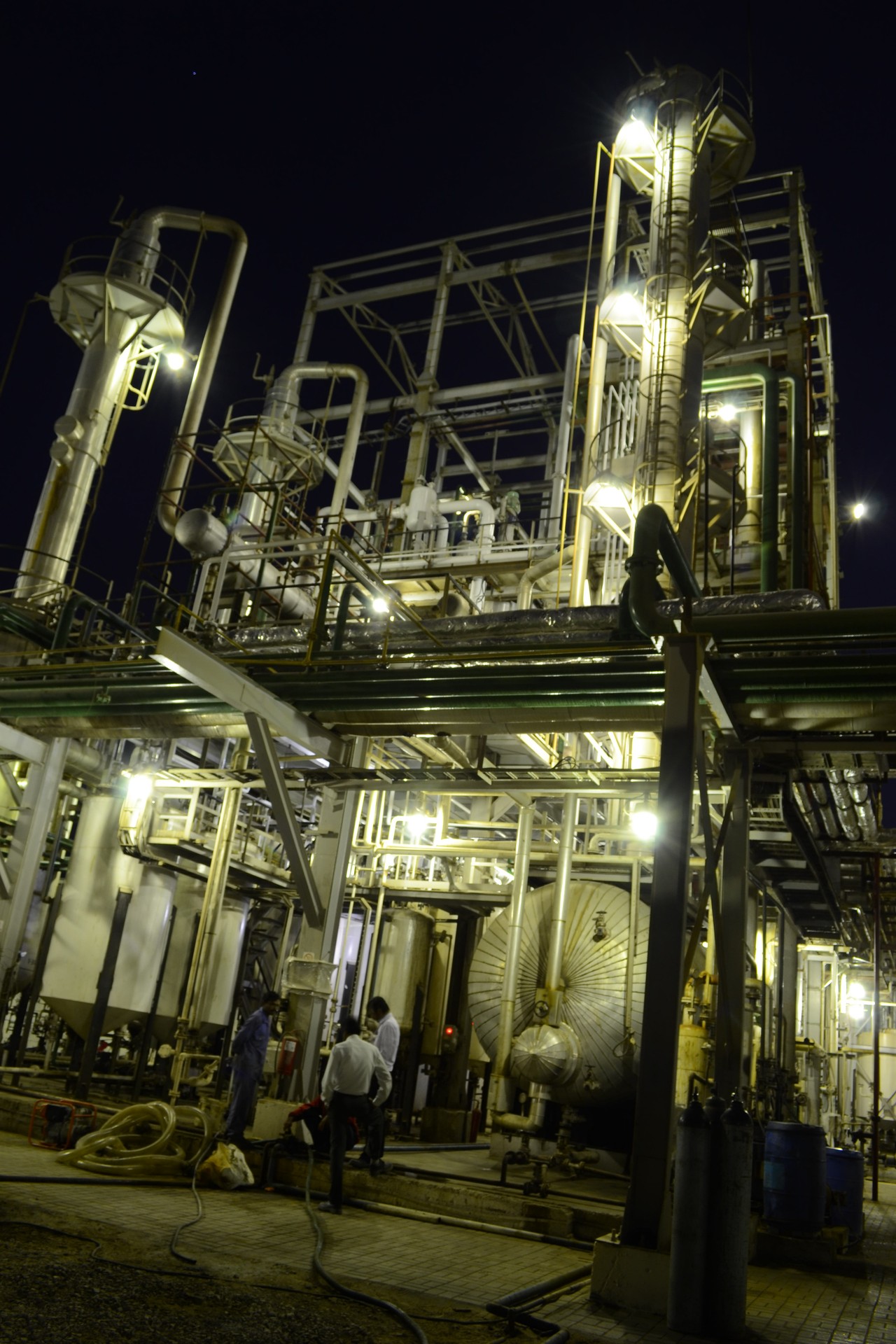 Oil-Tech modular refinery process unit illuminated at night